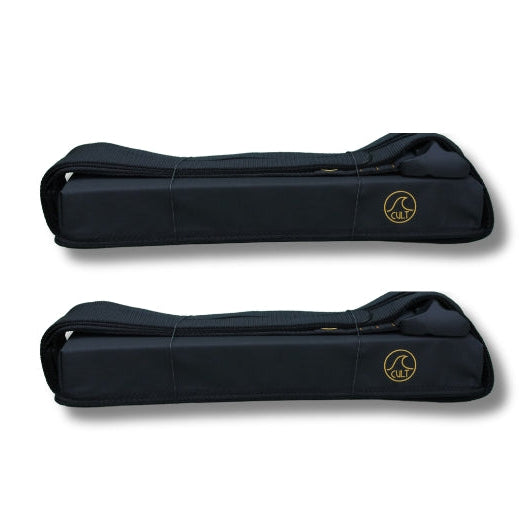 Two black instrument cases with gold circular logos, displayed horizontally on a white background.