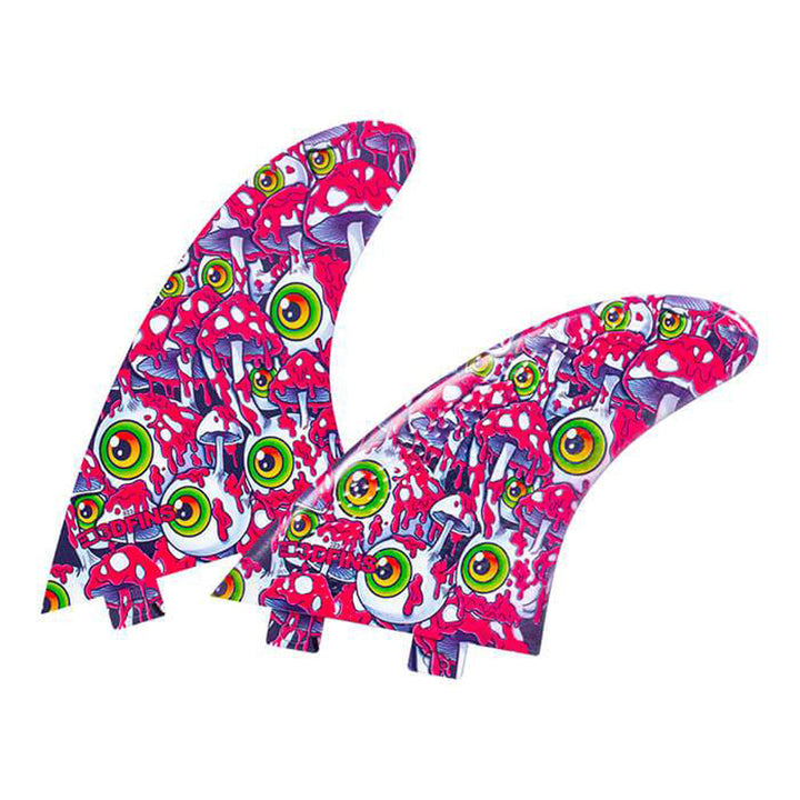 Two colorful surfboard fins with a vibrant pattern on a white background
