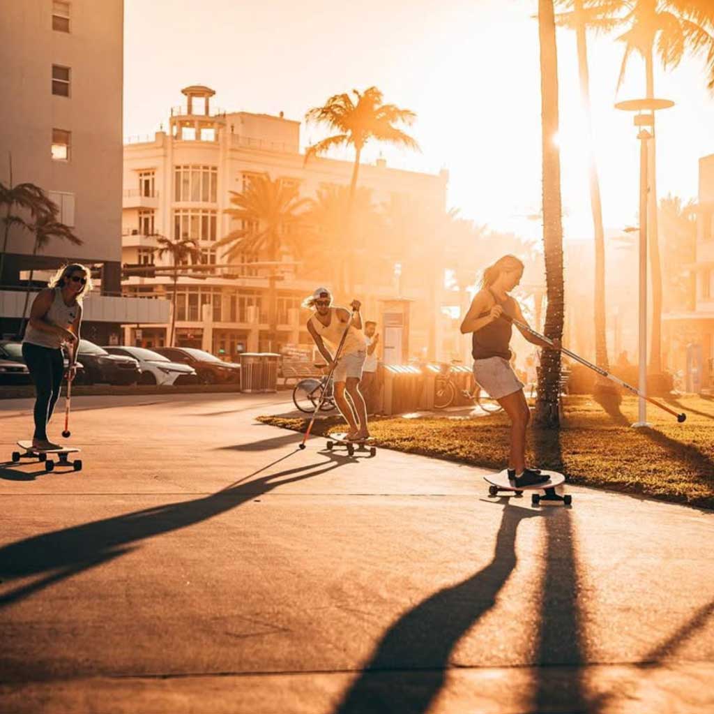 Group of skaters using hamboards longboard skateboards