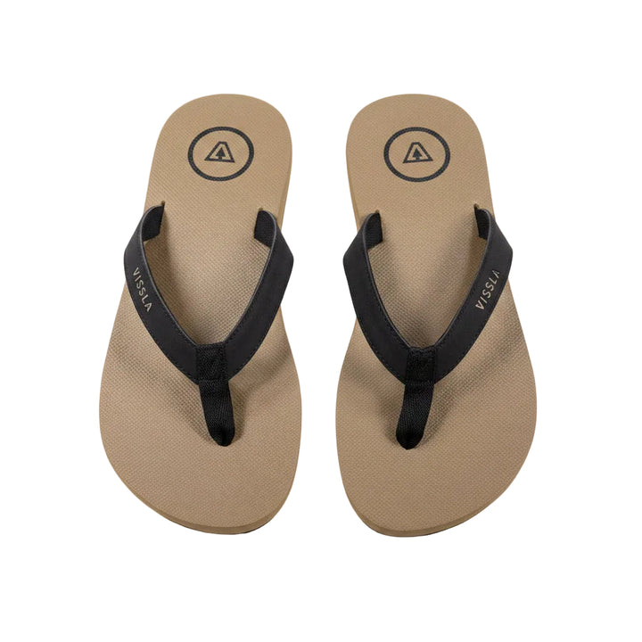 Pair of tan flip-flops with black straps on a white background