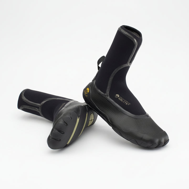 Pair of black surfing boots on a white background