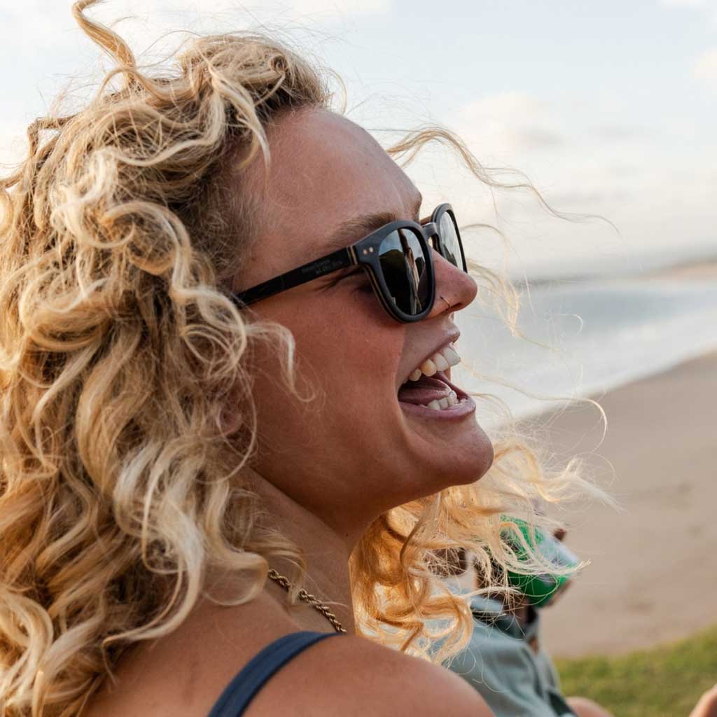 Union of Surf female glasses on a beach