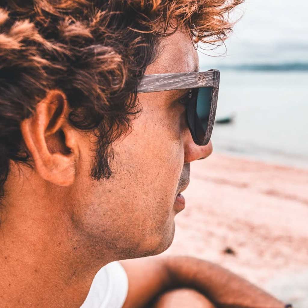 Union of Surf male glasses on a beach