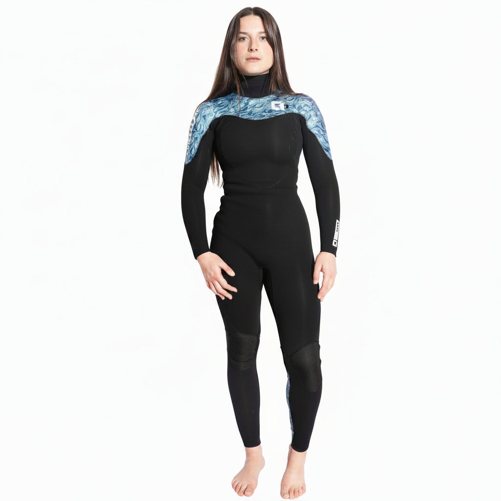 Person wearing a black wetsuit with blue pattern on a white background