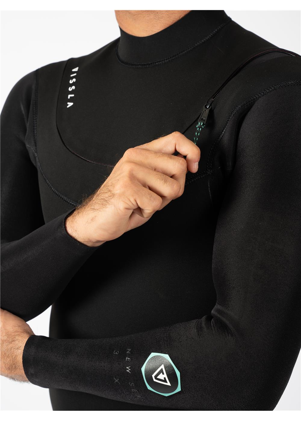 Close-up of Vissla New Seas wetsuit arm logo and chest zip.
